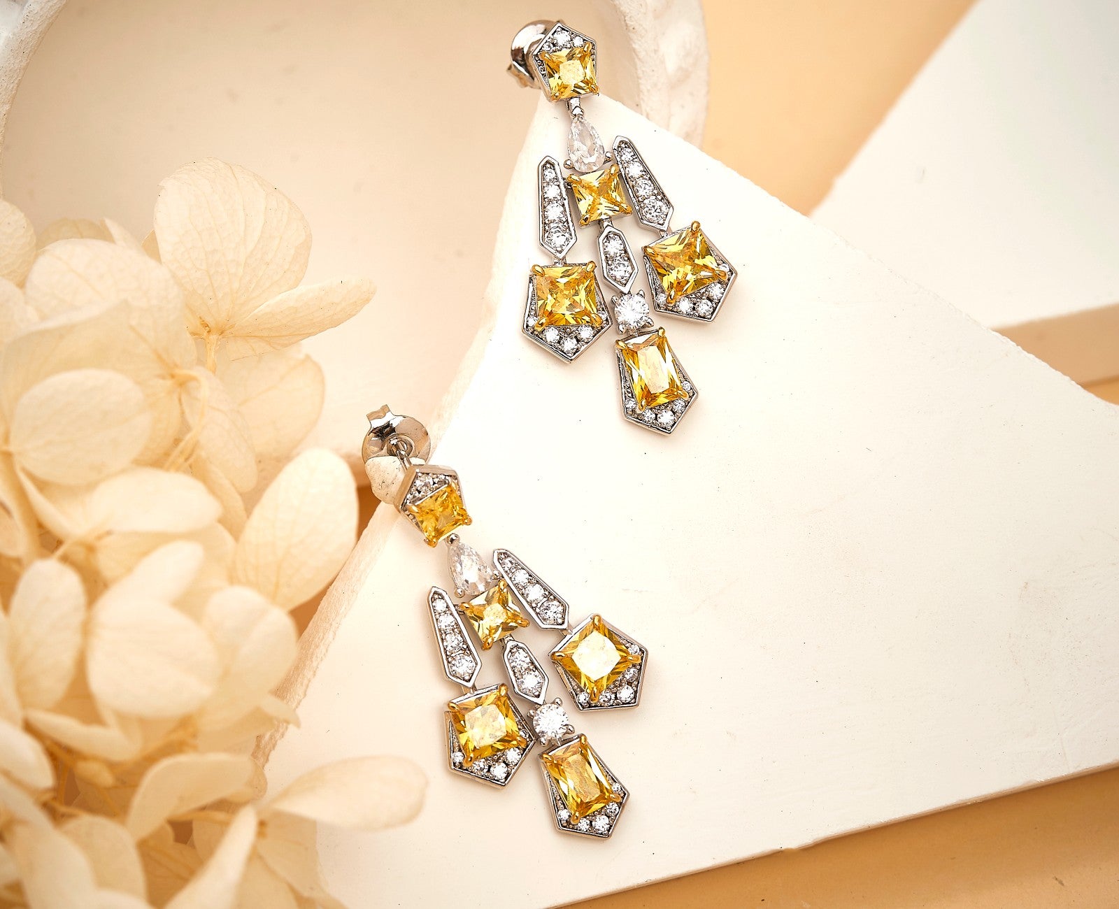 Solar cross drop earrings with yellow lab-crafted gemstones in 18K gold plating