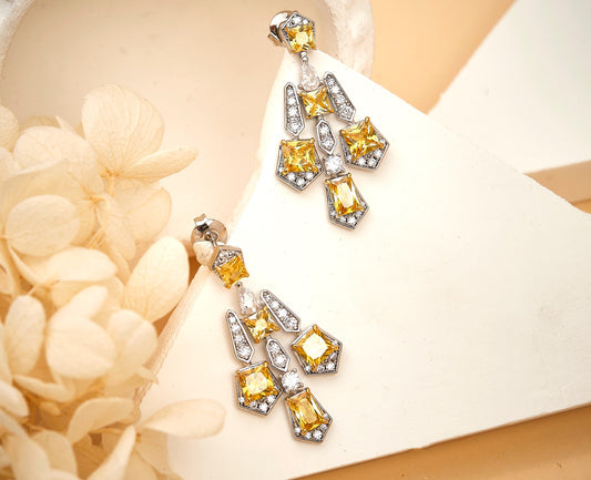 Solar cross drop earrings with yellow lab-crafted gemstones in 18K gold plating